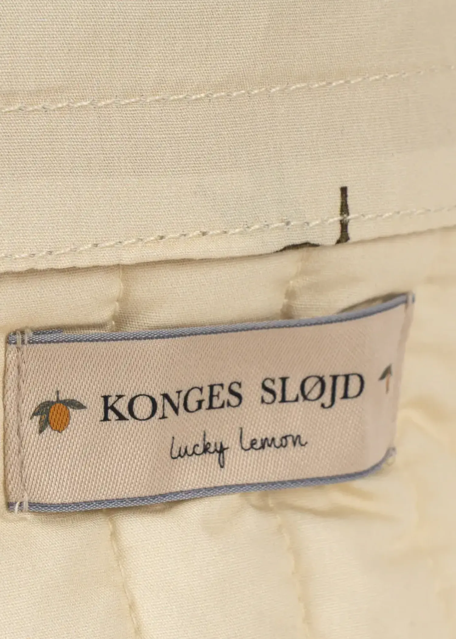Konges slojd Fotelik rowerowy dla lalki - lemon