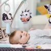 Dzieci Tiny Love Gimnastyka mata edukacyjna dla bobasa z pałąkami - Magiczna Kraina - czarno-biała