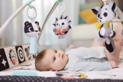 Dzieci Tiny Love Gimnastyka mata edukacyjna dla bobasa z pałąkami - Magiczna Kraina - czarno-biała