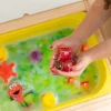 Glo Pals Kostki sensoryczne świecące w wodzie Elmo Ulica Sezamkowa - zabawka kąpielowa