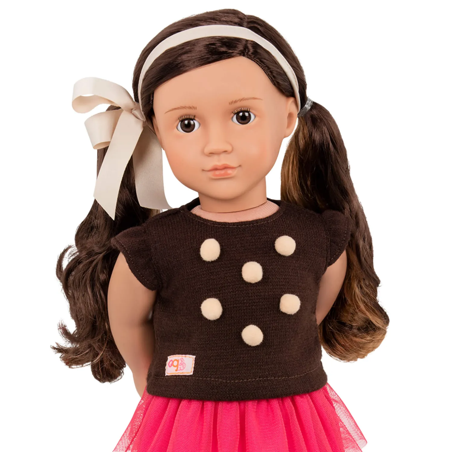 OurGeneration Lalka AVIA 46cm - Brunetka w bluzce z pomponikami