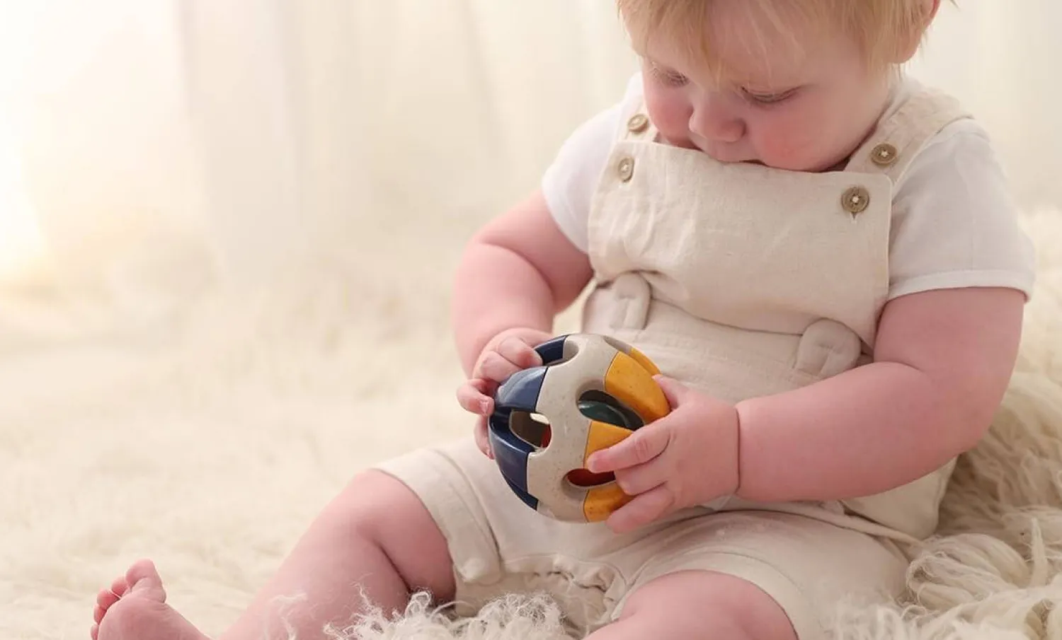 TOLO Bio Piłka grzechotka dla niemowlaka 3m+