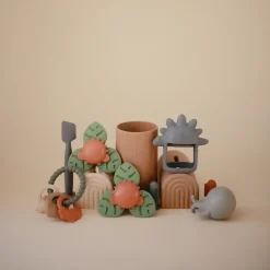 Mushie Spinner sensoryczny z przyssawką - Dino