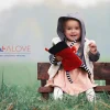 Lullalove Super Zabawka MrB - przytulanka termofor na kolkę, kontrastowe kolory