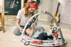 Dzieci Tiny Love USZKODZONE OPAKOWANIE: Gimnastyka, mata edukacyjna z pałąkami - Tiny Rockers