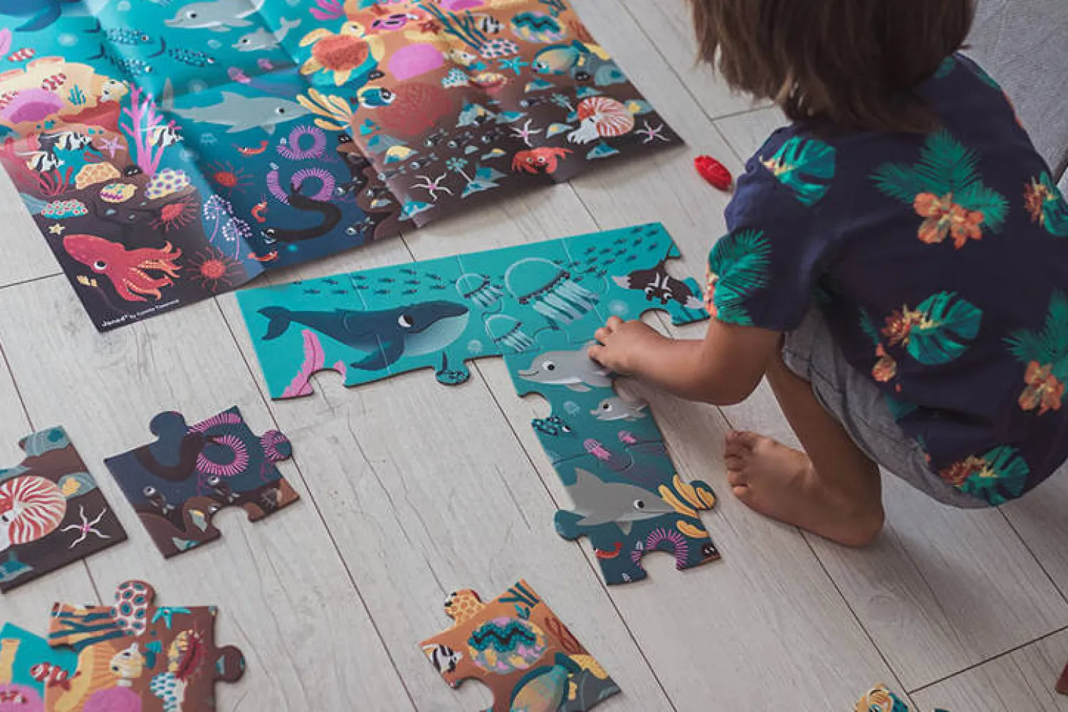 Janod Świecące puzzle z mini-lampką UV Ocean 24 elementy 3+