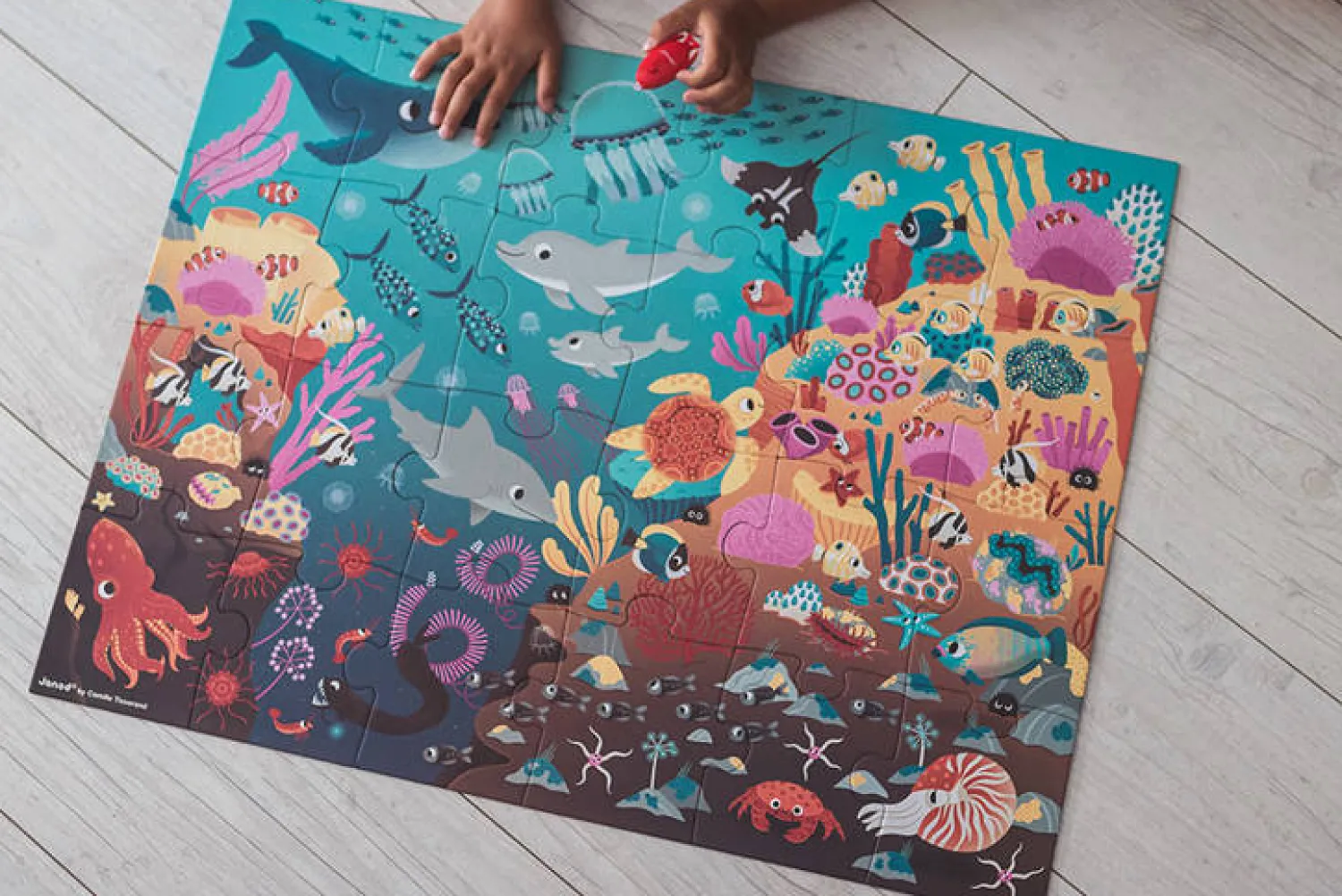 Janod Świecące puzzle z mini-lampką UV Ocean 24 elementy 3+